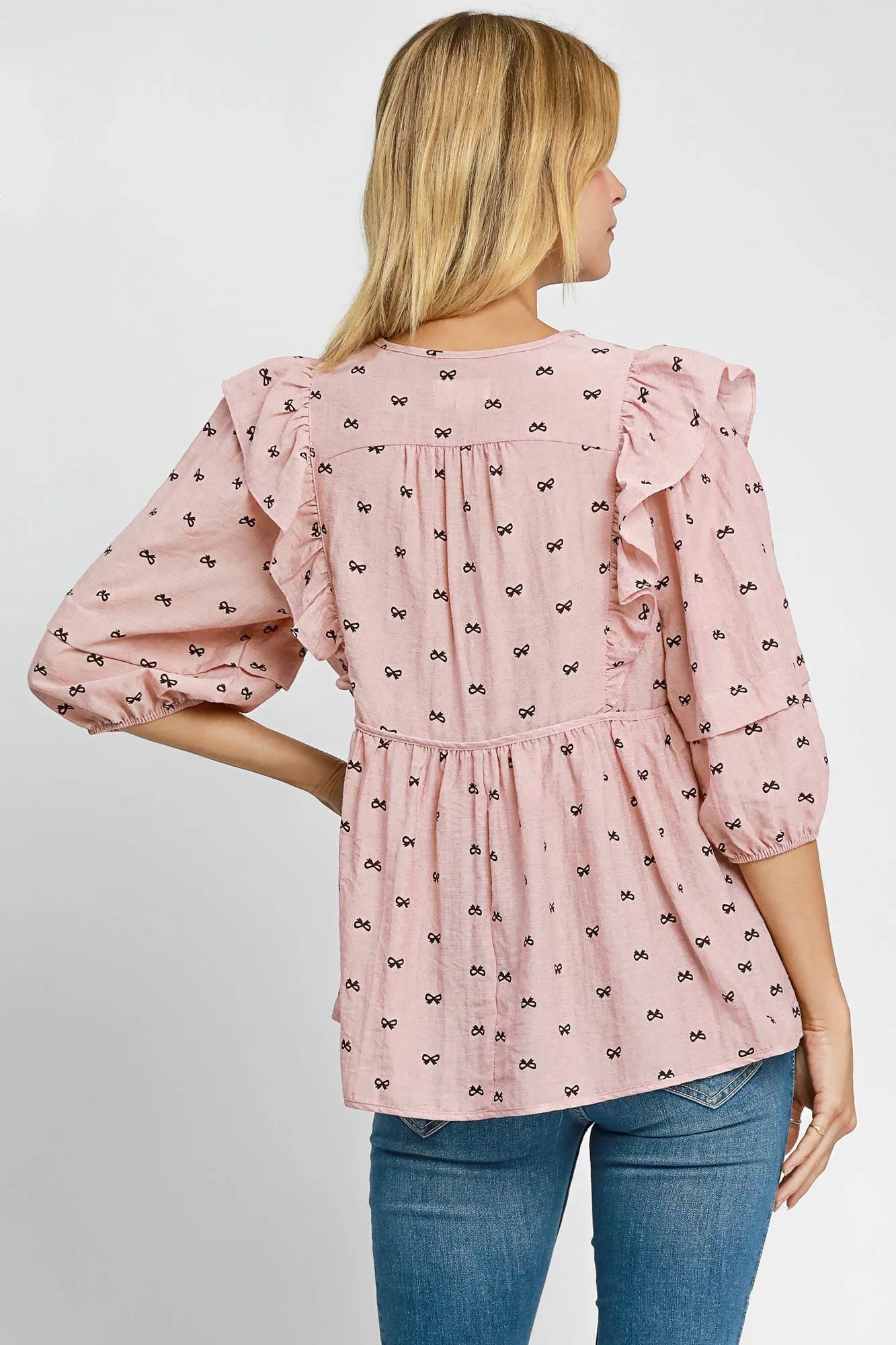 Pink Bow Print Ruffled Peplum Blouse