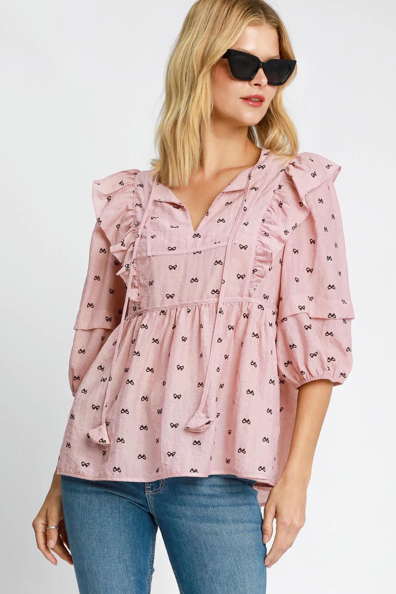 Pink Bow Print Ruffled Peplum Blouse